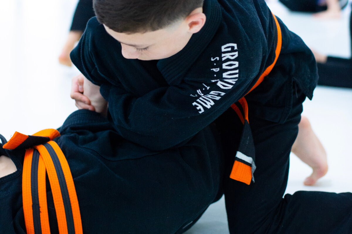 Pasy BJJ dla dzieci: Kompletny przewodnik po stopniach i rozmiarach